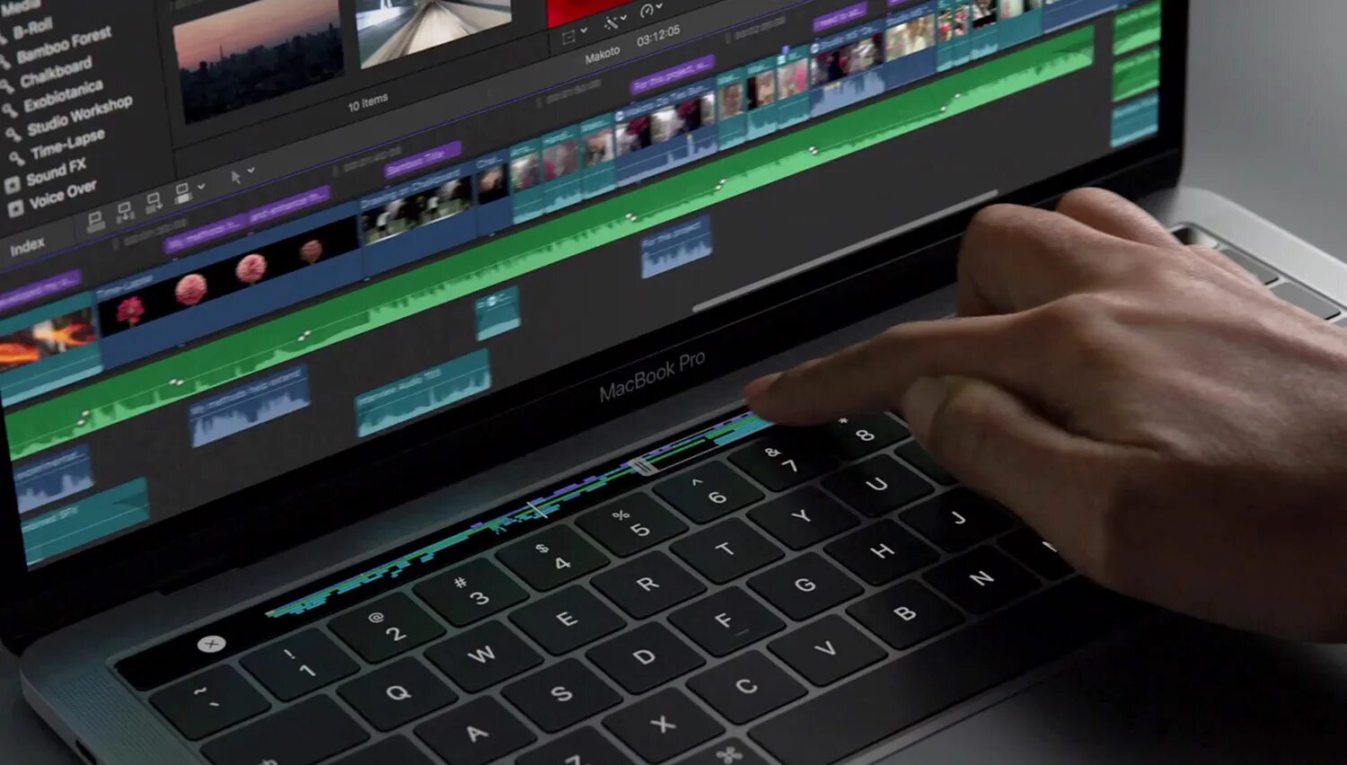 Mac touch. Ноутбук с видеоредактором. touch bar установить на windows. touch bar home app. нажать на виртуальную кнопку.