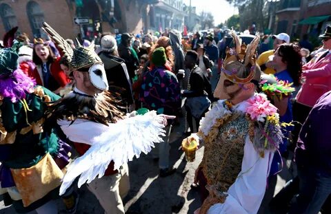 20. Revellers dance in the streets of the Marigny Mardi Gras Day on March 5...