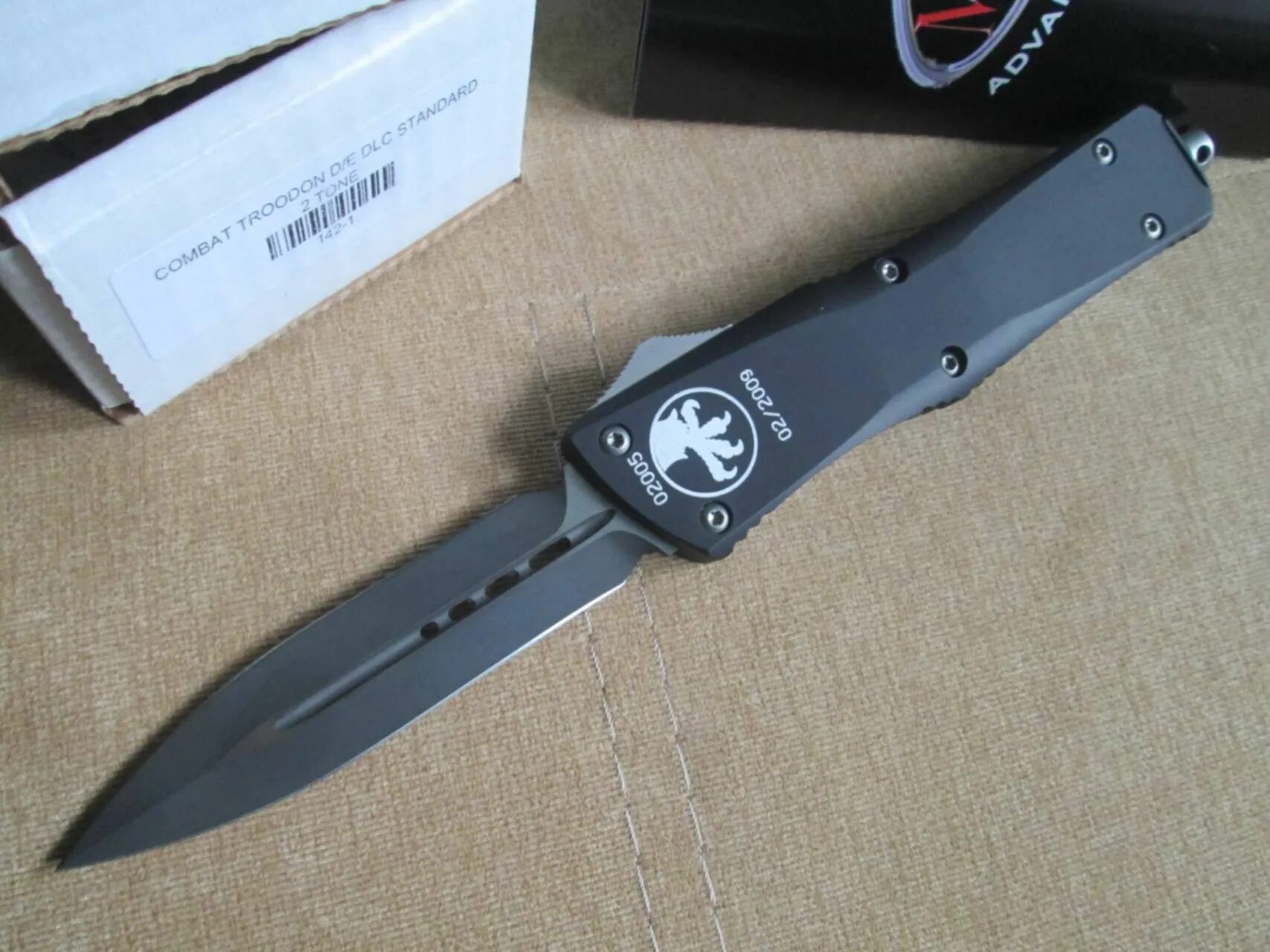 Microtech combat. Нож Microtech Combat Troodon. Microtech Combat Troodon 00556. Microtech Combat Troodon оригинал. Microtech Troodon mk2.