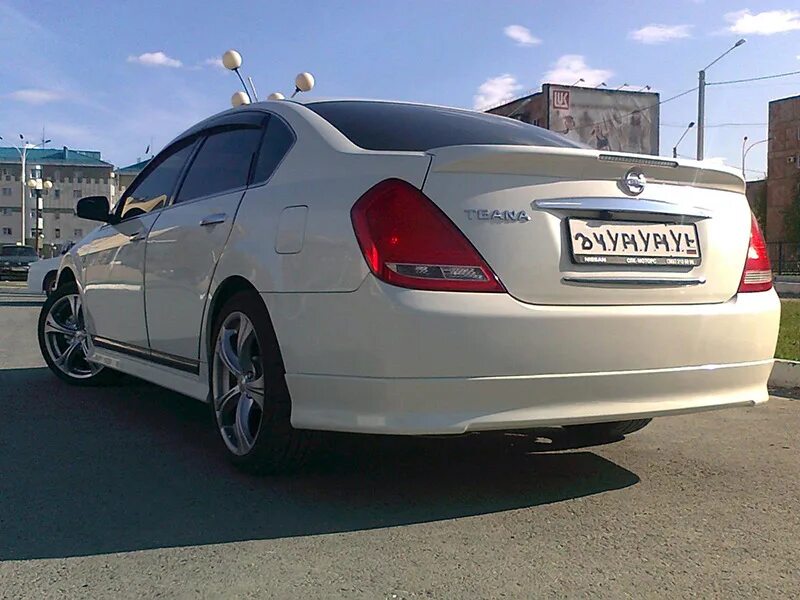 Nissan teana j31 axis autech. Ниссан теана j31 tuning. Nissan teana j31 фары eagle eyes. Тюнинг ниссан j31. Теана j31 tuning.
