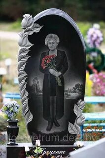 Красивый памятник женщине на кладбище