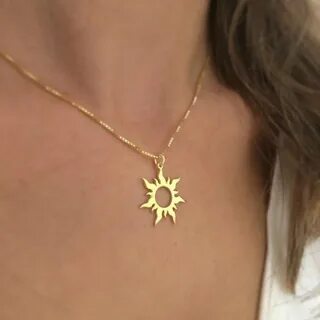 Вид золотой кулон