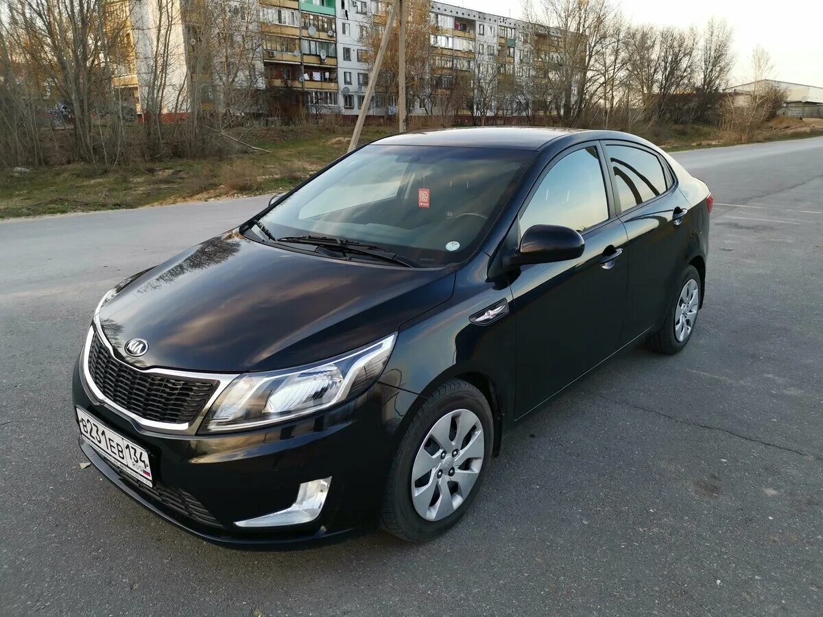 Купить киа в волгограде с пробегом. Киа Рио черная 2014 года. Kia Rio 2012 черная. Киа Рио 1.6 2014 черная. Kia Rio 2012 Black.