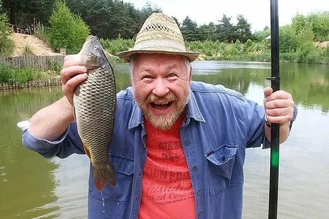 Большой рыба на удочке