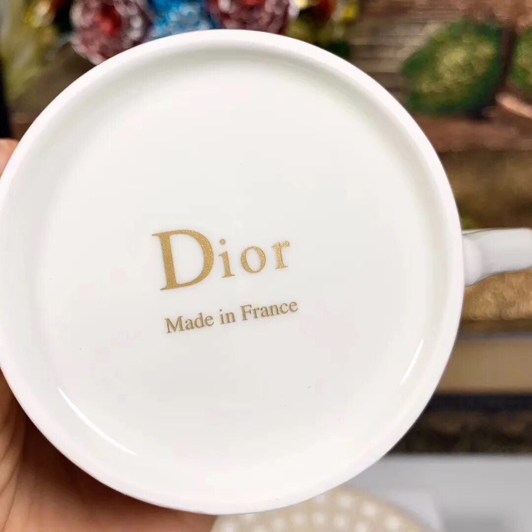 тарелки christian dior. мейсон диор фарфор. сервиз диор чайный le soleil. посуда диор. посуда кристиан диор.