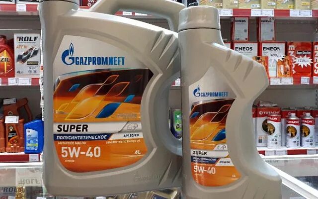 Моторное масло на азс газпромнефть. Автомасла джи энерджи. Азс газпромнефть масла. Азс газпромнефть масла. Выкладка товара на азс.