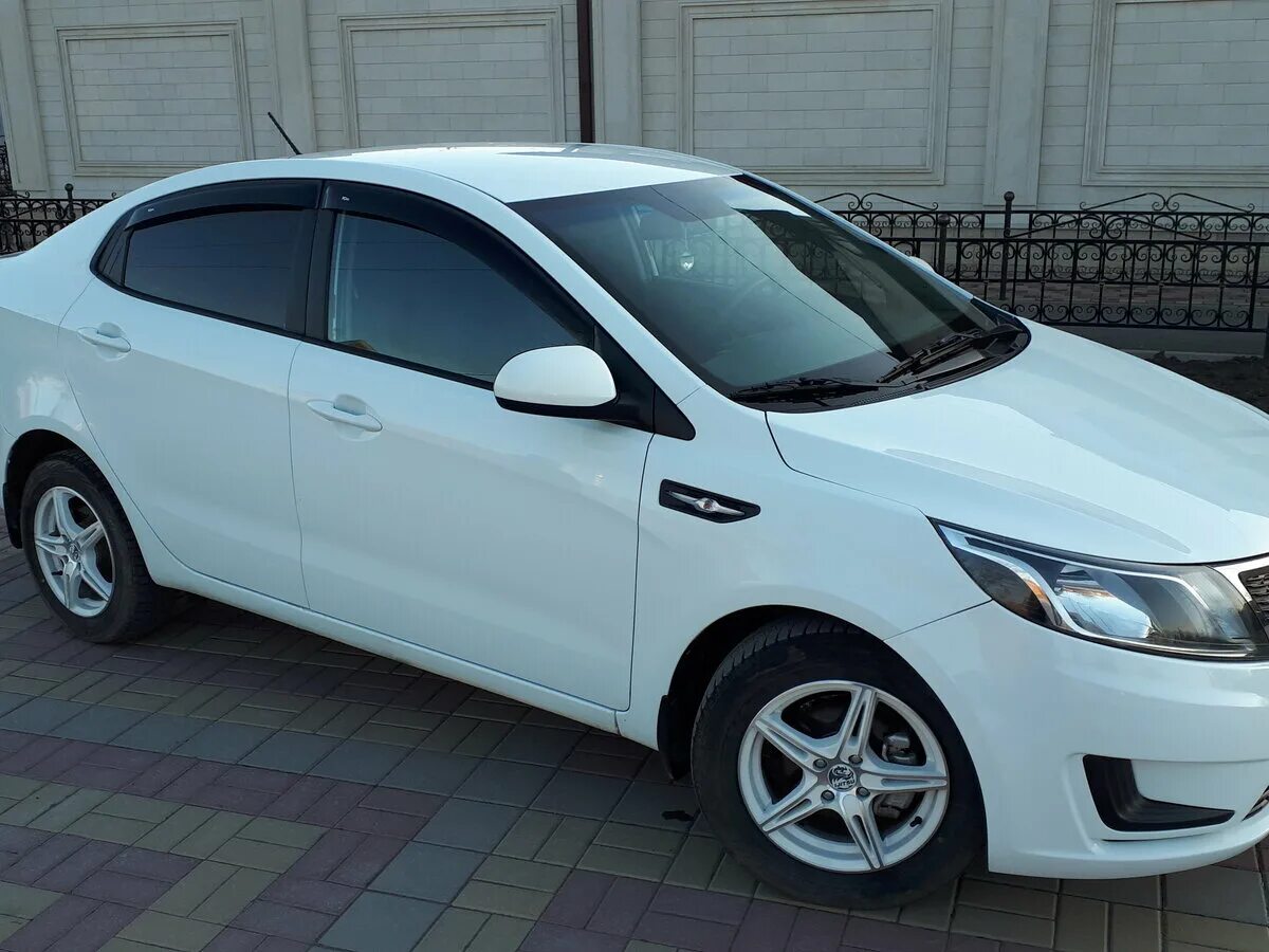 Форум киа рио 3. Kia Rio III 2013. Kia Rio III седан 2013. Киа Рио 3 1.4. Киа Рио 3 седан 2013 механика.