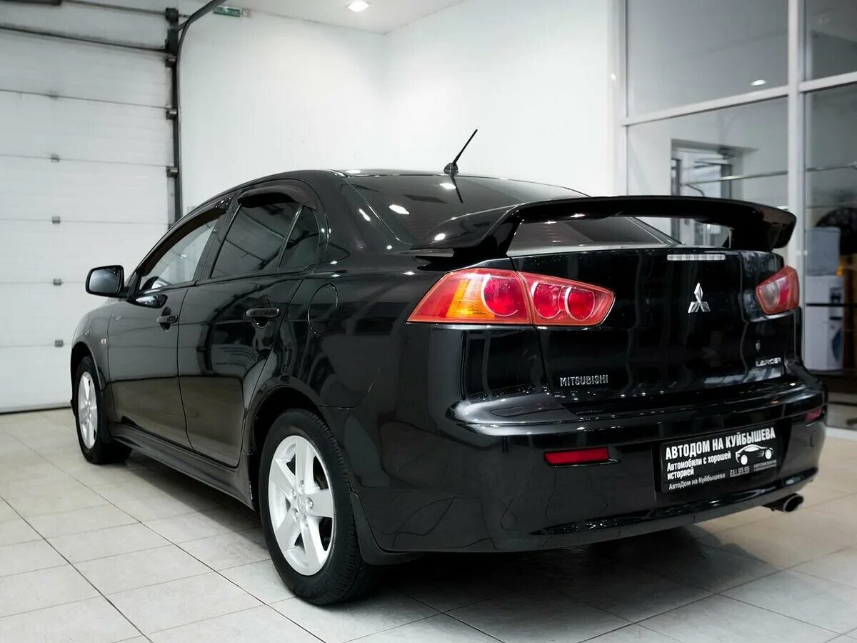 Mitsubishi lancer авито. Митсубиши Лансер 10 черный. Mitsubishi Lancer 10 черный. Митсубиси Лансер 2007 черный. Митсубиси Лансер 10 черный 2.0.