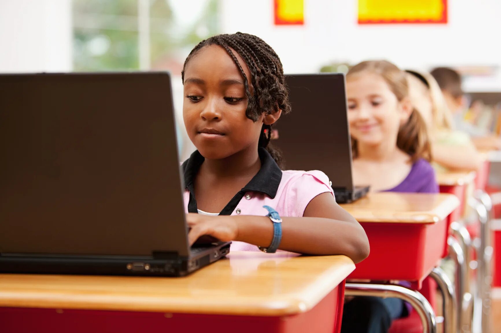 Children programmes. Black African. Children in Classroom on Computers. African students in School Technology. Kids using Laptop.