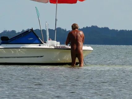 Naked guy loves to boat "unrestricted" on Sarasota Bay.