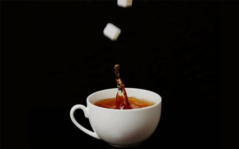 There is some sugar in the tea. Darkness чай. чай a little more. little tea in a cup. tea and sugar love.