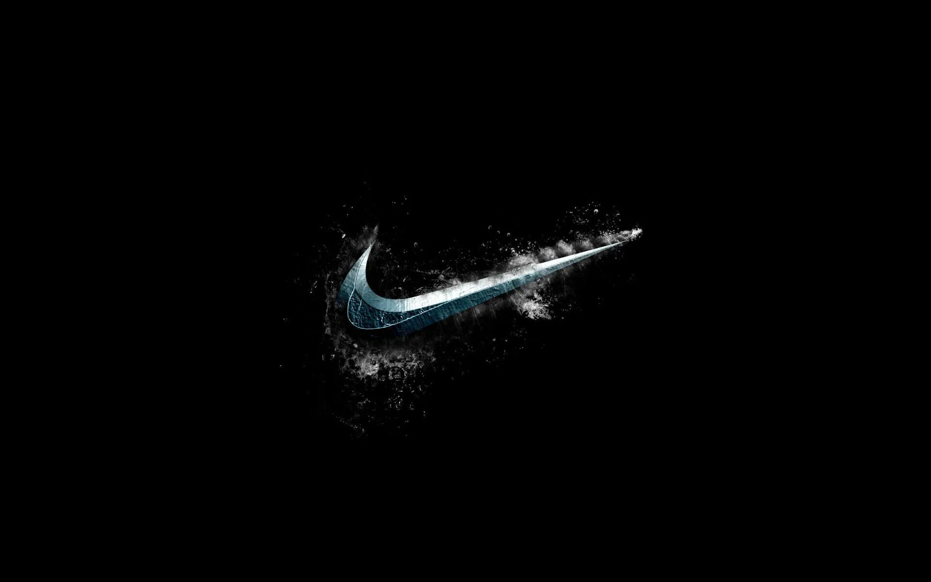 Стол найк. Значок найк. Обои найк. Nike на черном фоне. Картинки найк на рабочий стол.