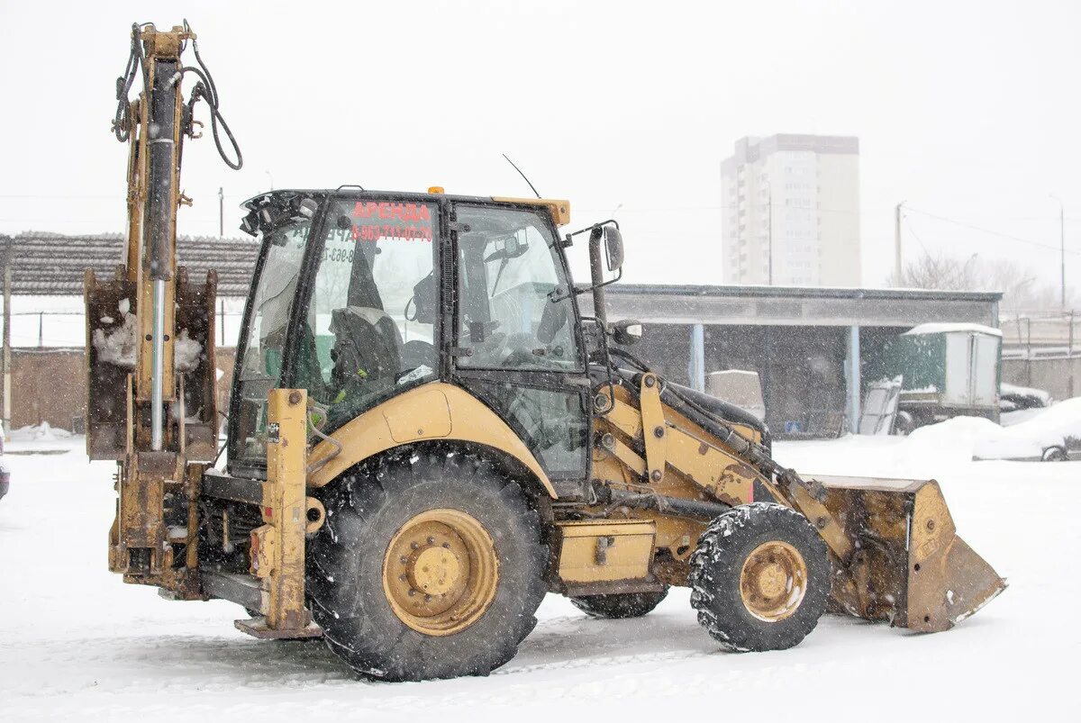 Трактора экскаватор погрузчик б у. Экскаватор-погрузчик Caterpillar 428. Cat 428e с гидромолотом. Cat 428e стрела. Катерпиллер 428е.