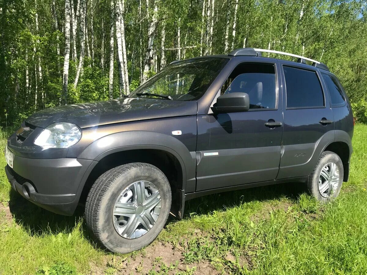 нива шевроле 2013 года выпуска. нива шевроле 2013 года выпуска. Chevrolet niva 2013 года. шевроле нива 2013. нива шевроле 2013 года выпуска.