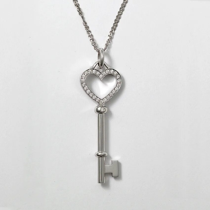 Серебряная подвеска ключик санлайт. Подвеска ключ. Кулон ключик. Ключик из белого золота с бриллиантами. Санлайт подвеска ключик серебро.