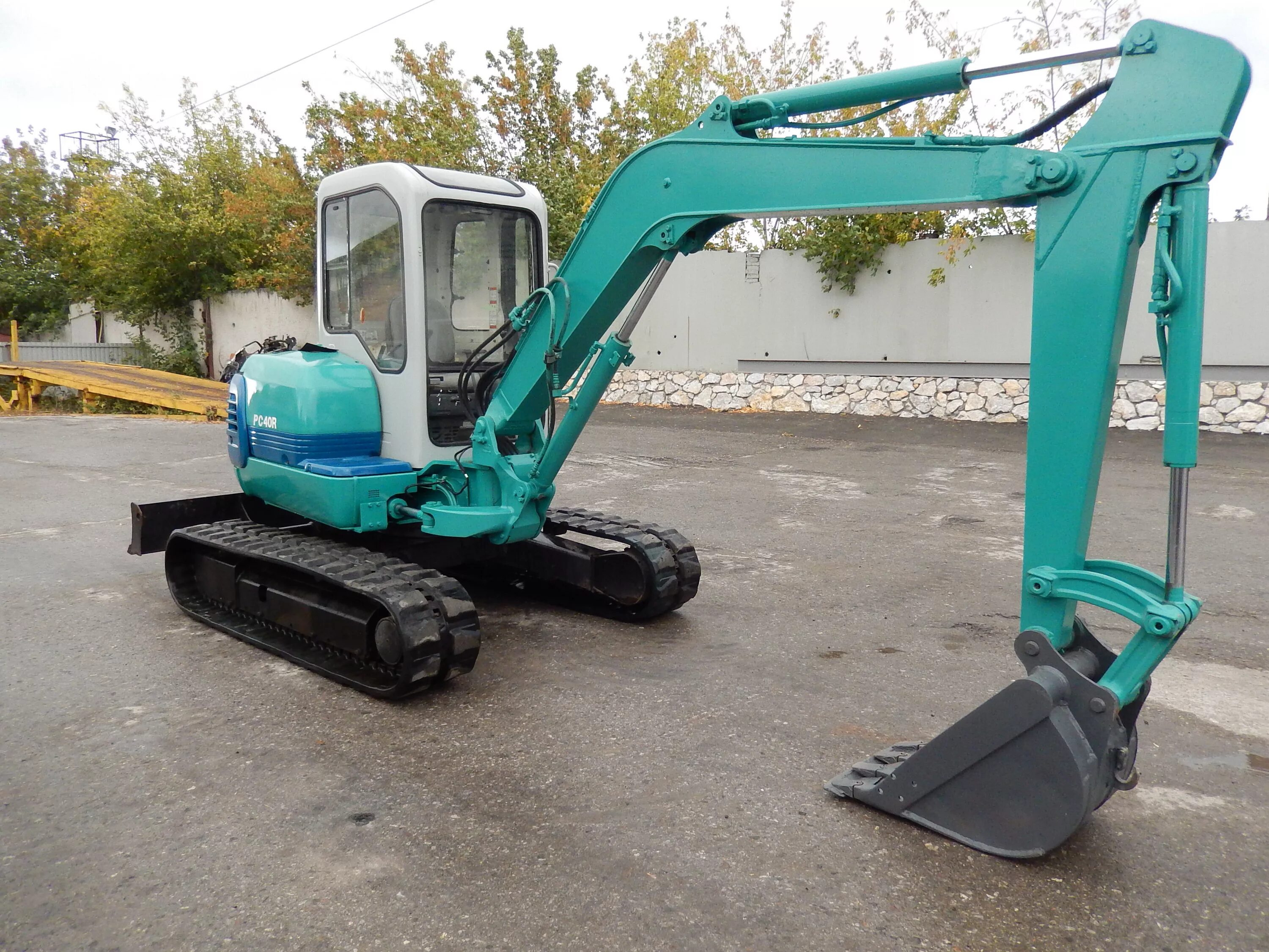 Мини экскаватор купить на авито б у. Мини-экскаватор Komatsu pc01-1. Kubota мини экскаватор 24. Мини экскаваторы японские 1990. Мини экскаватор Airman 15.