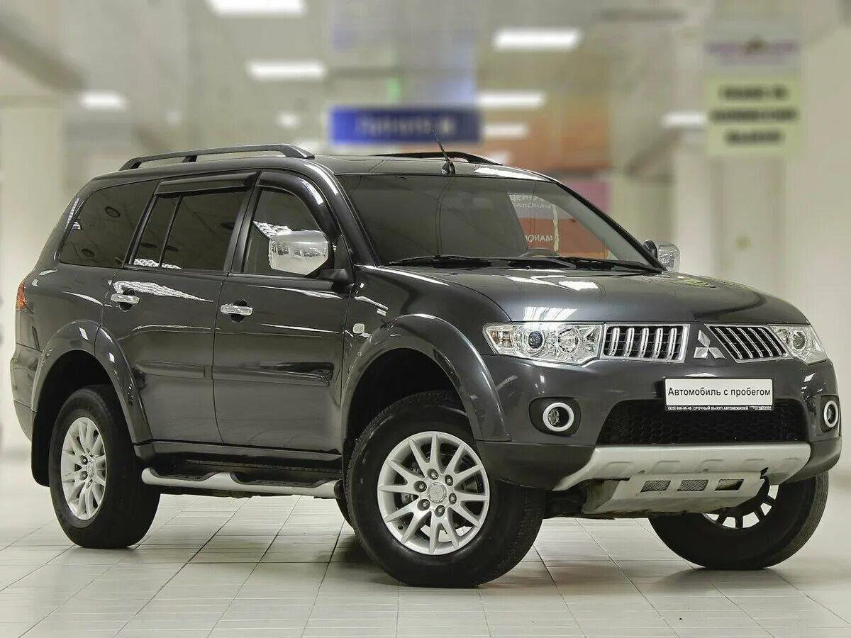 Mitsubishi Pajero Sport 2. Паджеро спорт 2009 года. Mitsubishi Pajero 2009. Митсубиси Паджеро спорт 2 серого цвета.