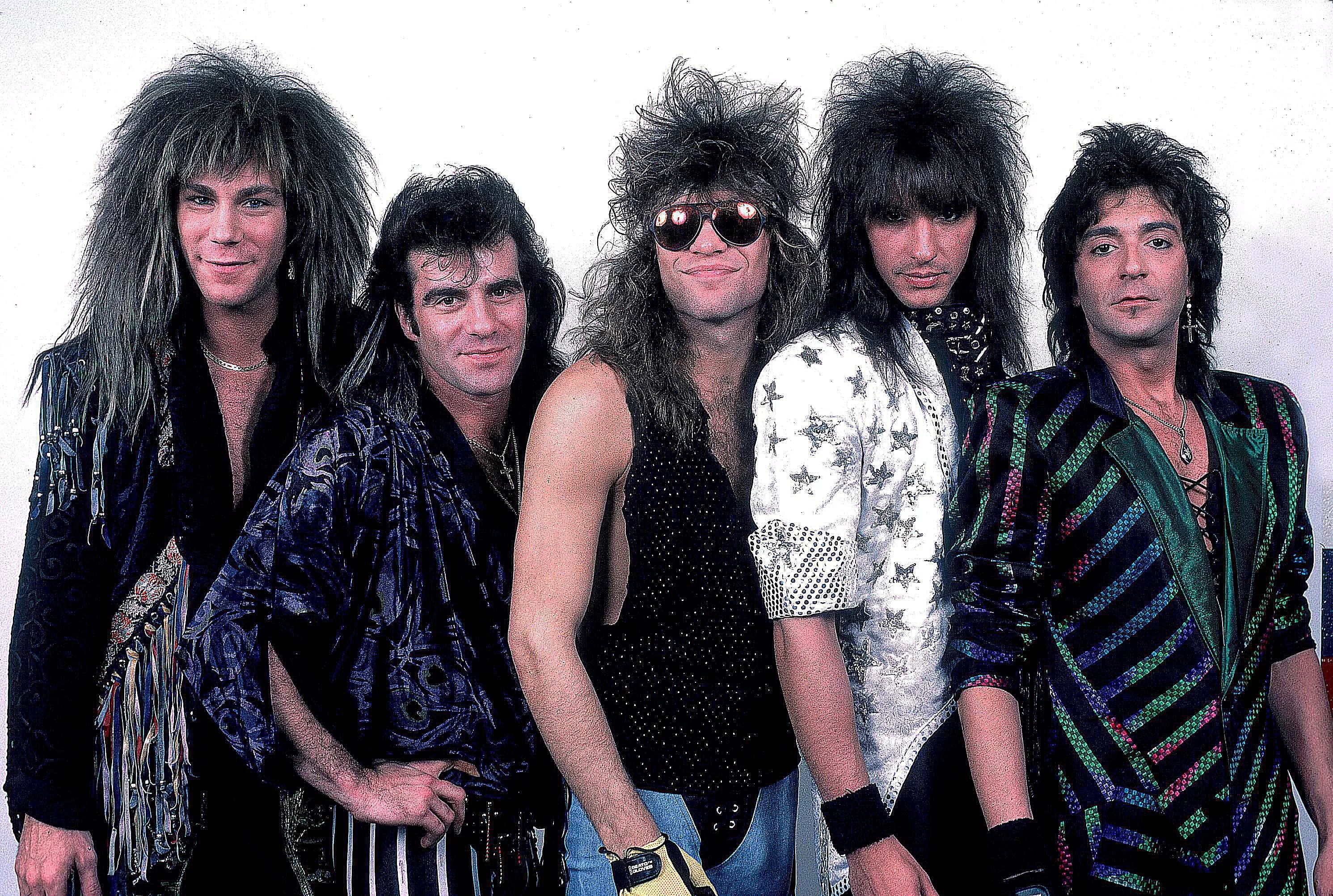 Слушать зарубежные рок 80 90 х. Глэм рок группы 70-80. Рок группы 70х 80х. Глэм рок 70х группы. Bon Jovi 1986.