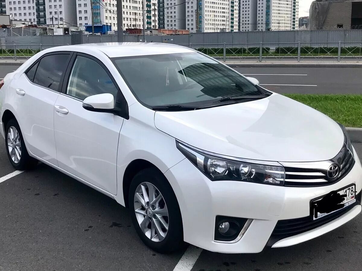 Королла 2014 купить. Toyota Corolla 2014. Toyota Corolla e180. Toyota Corolla e170. Тойота Королла 2014.