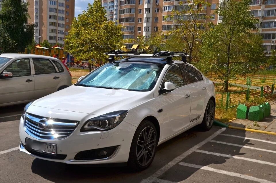 Багажник крыша opel. Thule Opel Insignia багажник на крышу. Insignia 2g Thule. Opel Insignia с багажником на крыше. 9595 Opel Insignia 2g Thule.