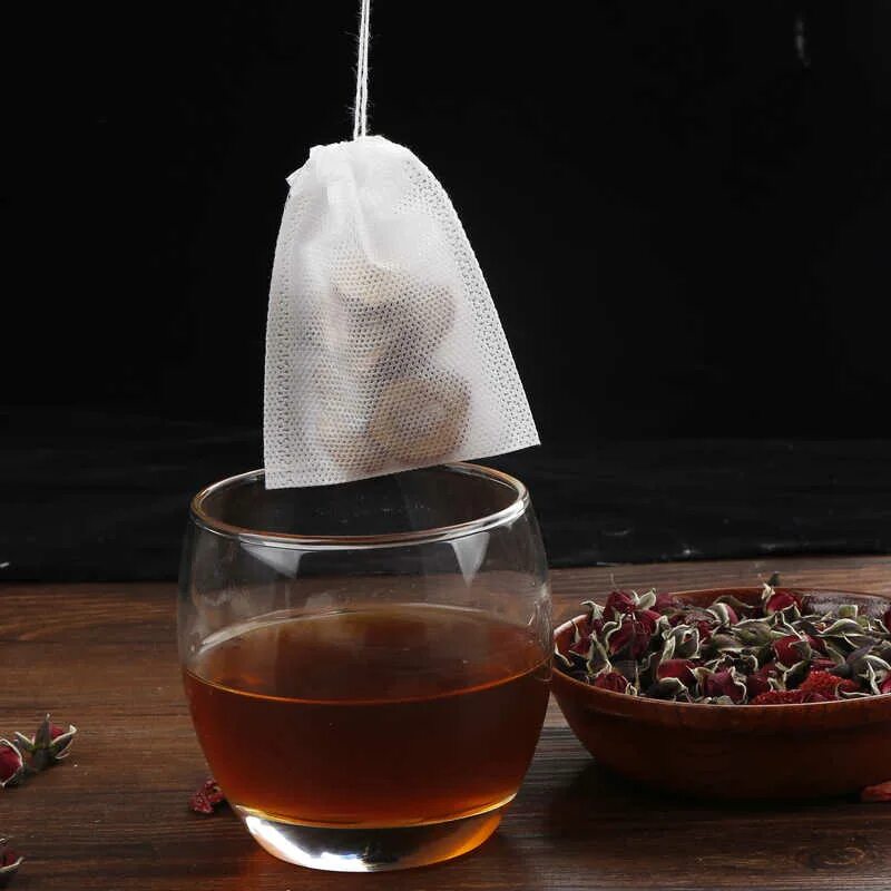 чайный пакетик в кружке. чай пакетированный. чайный пакет. чай в пакетиках. чай одноразовый в пакетиках.