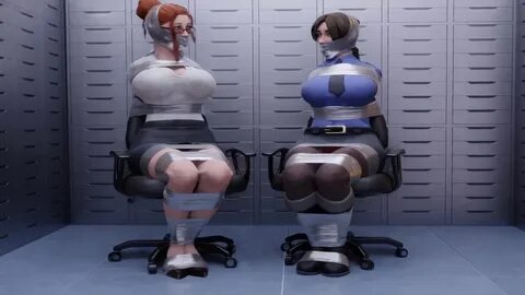 Two Busty Women Taped And Gagged In A Company Vault 