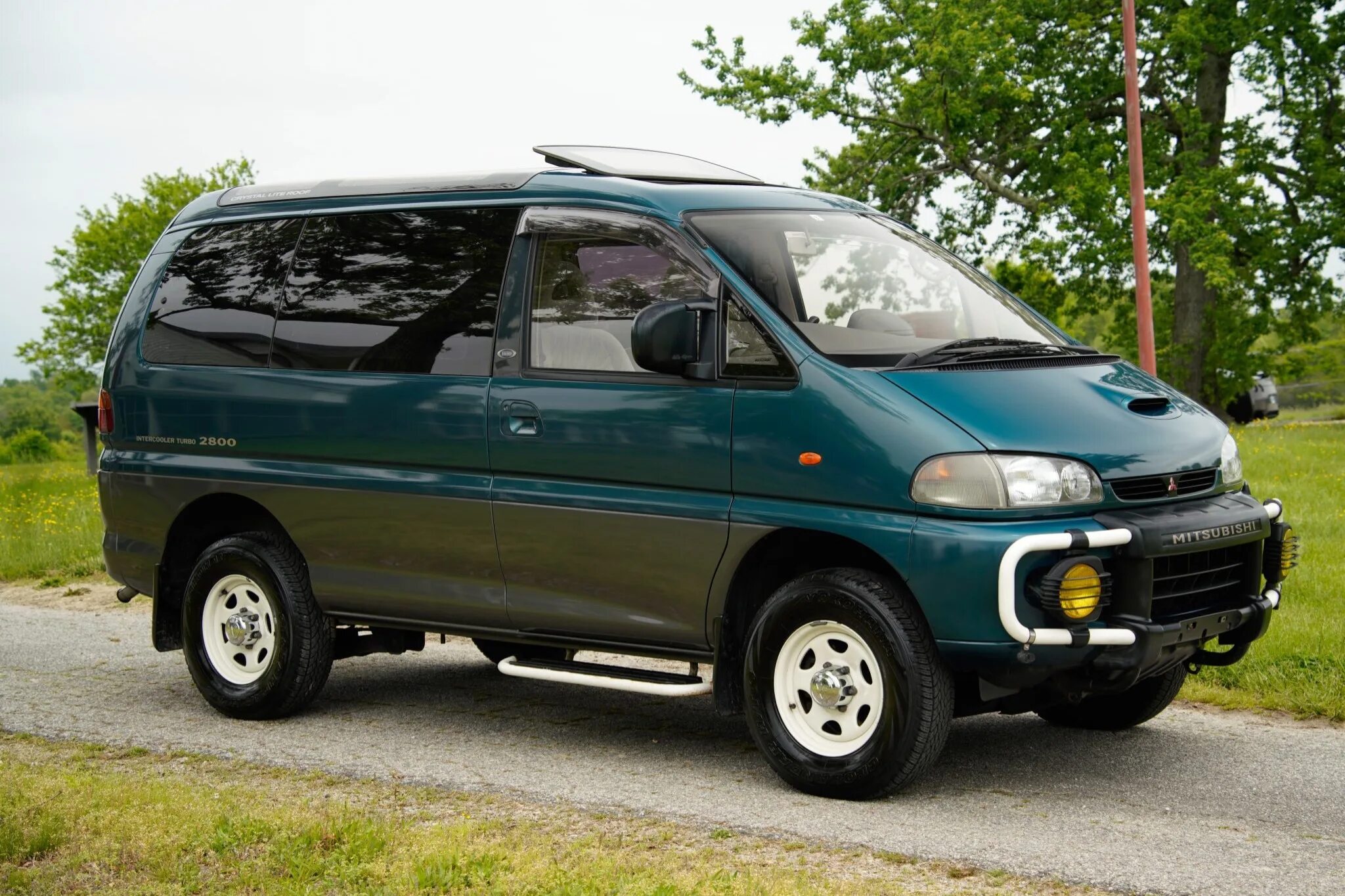 Мицубиси l400. Мицубиси Делика l400. Mitsubishi Delica Space Gear. L400 Mitsubishi 4x4. Delica отзывы