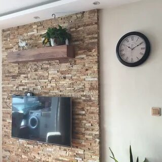 На какой высоте вешать часы