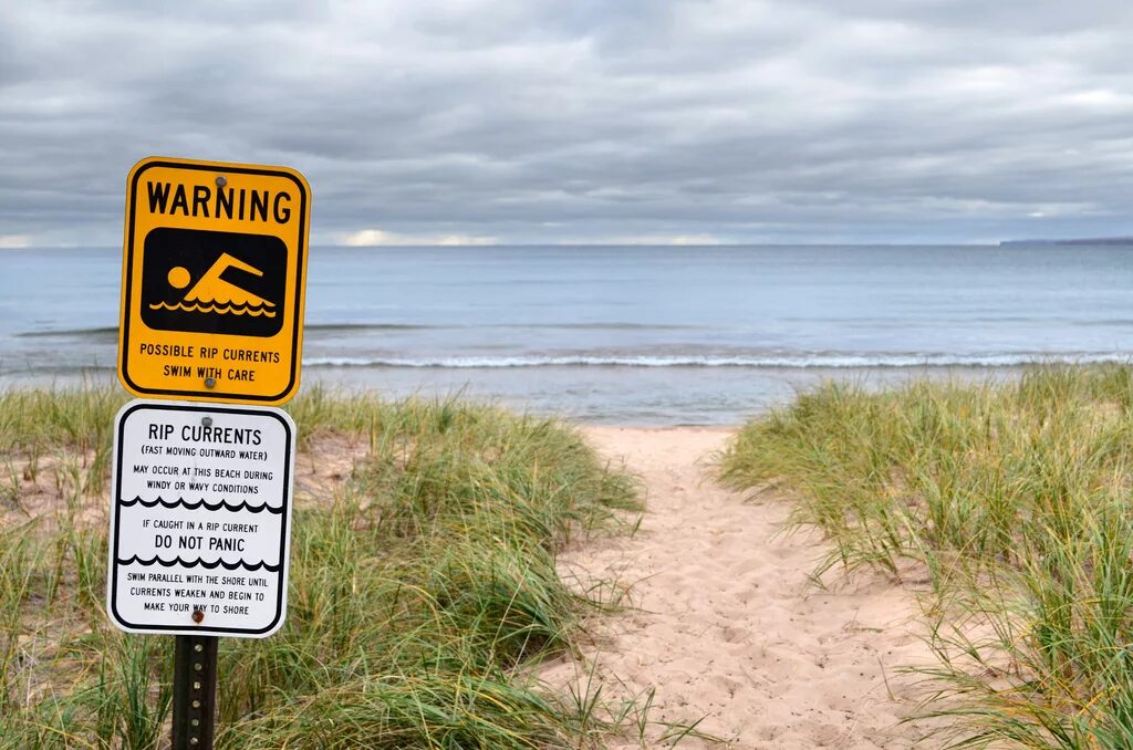 Current warning. Рип мичиган. rip current. caution current.