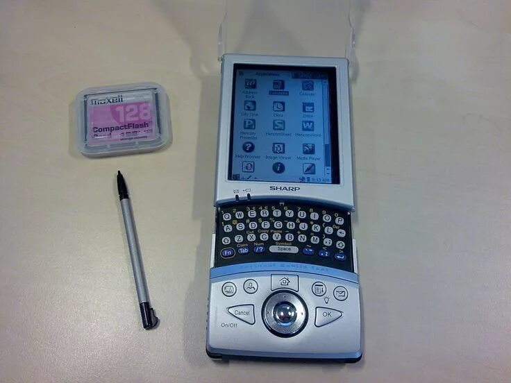 Sharp zarus personal electronic organizmi. Asus zenfone 9 pro. Apple iphone 5. Motorola micro tac elite. Iphone 5s gold.