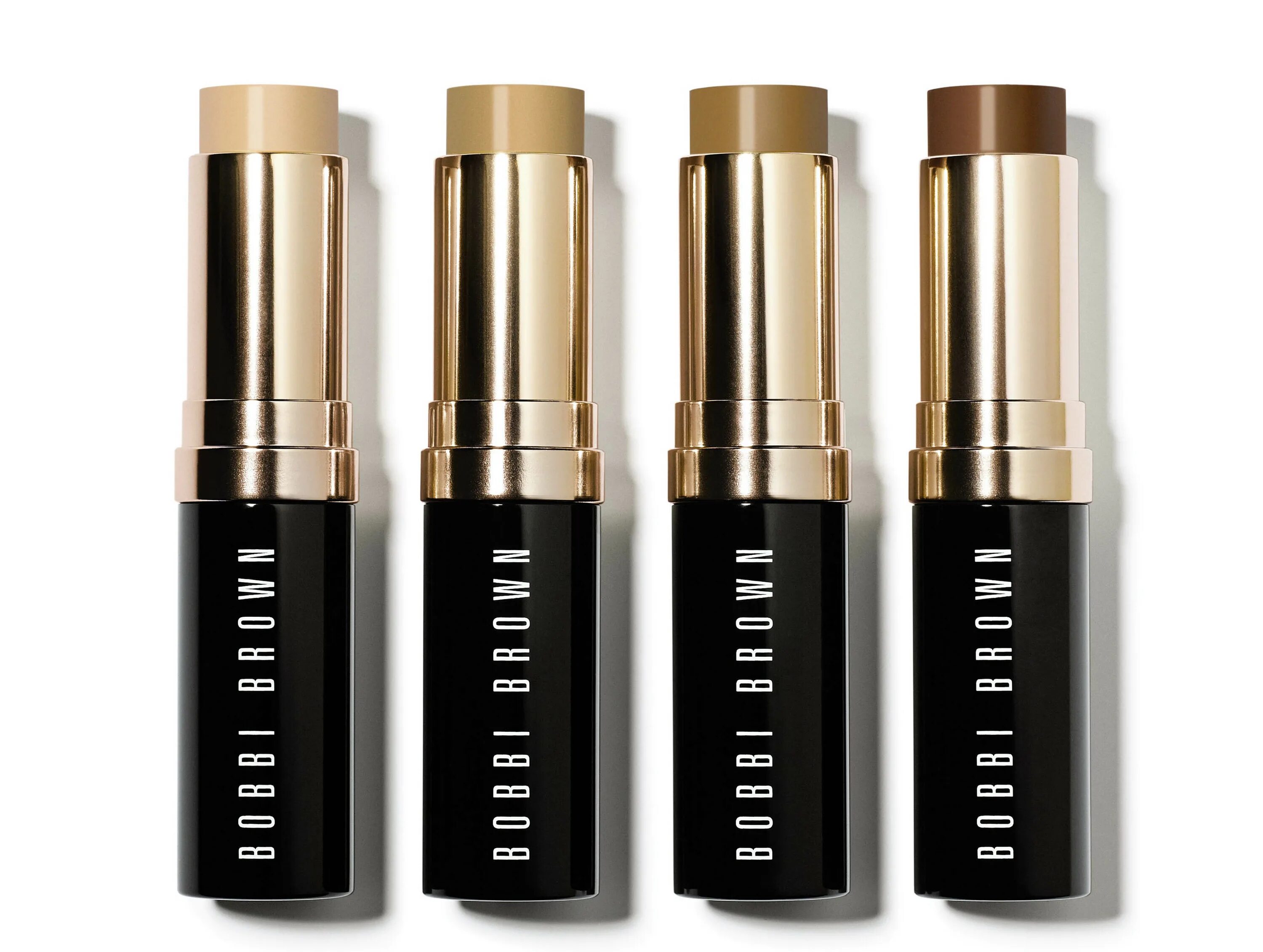 Brown foundation. Тональный стик Бобби Браун. Bobby Brown тональный стик. Bobbi Brown стик консилер. Bobbi Brown Skin Foundation Stick.