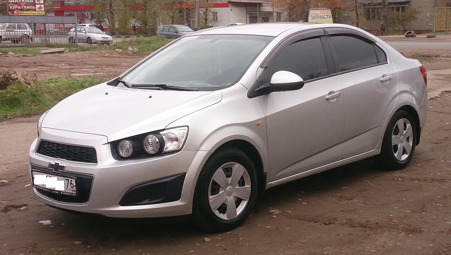 Aveo t300. Шевроле t300. Авео т300 2014. Шевроле Авео т300 2014 седан. Колпак авео