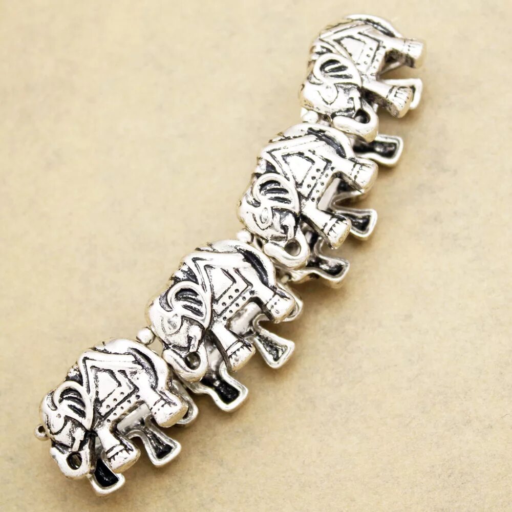 Swarovski браслет elephant. Браслет со слониками. Браслет со слоном. Браслет со слониками. Браслет со слоном.