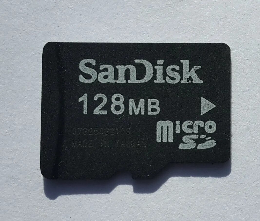 Микро память 128 гб купить. SANDISK Micro 128 MB. MICROSD 128 TB. SANDISK MICROSD 2006. SD карта 128 MB фото.