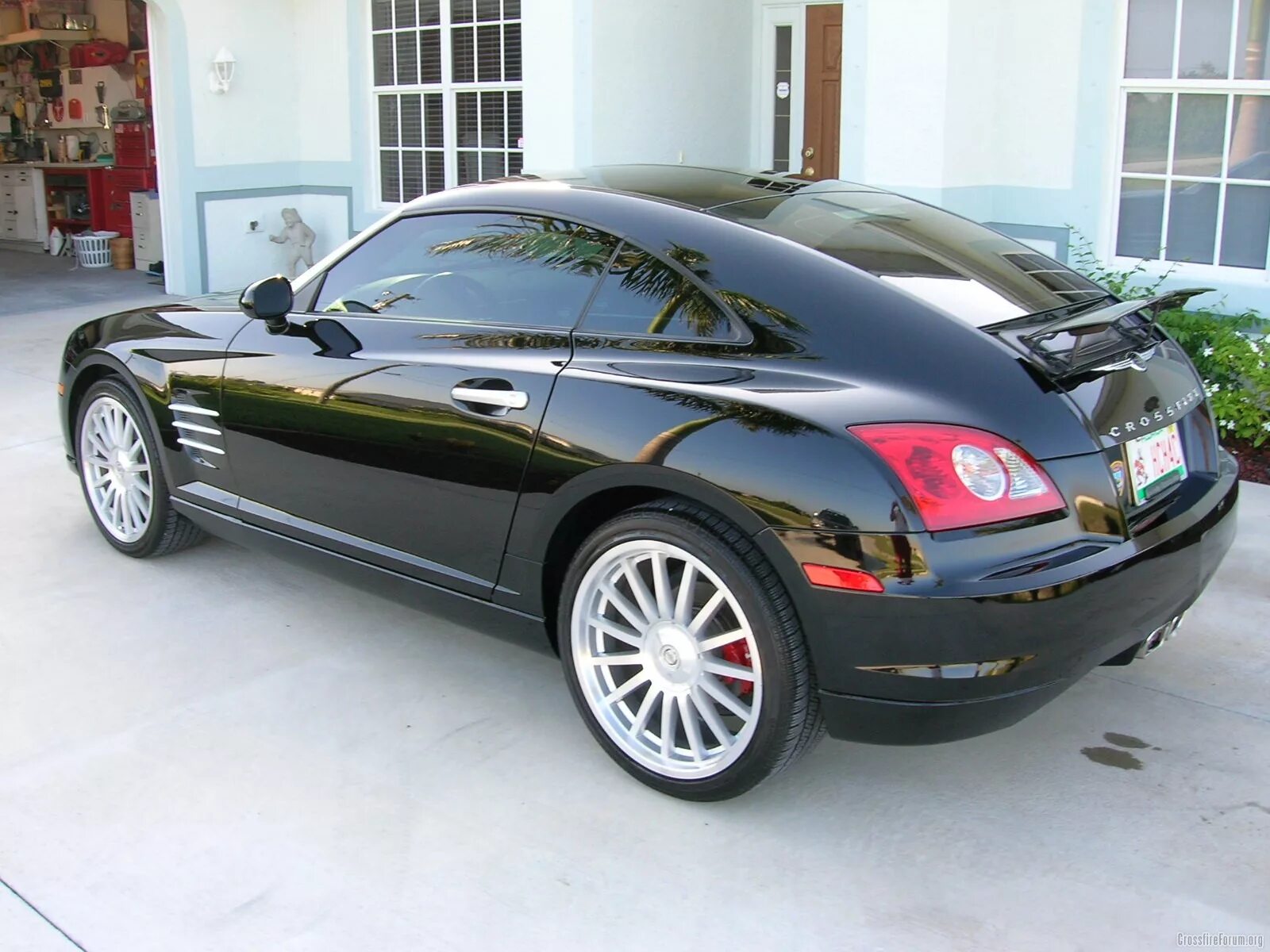 Кроссфаер отзывы. Chrysler Crossfire 2004. Chrysler Crossfire. Chrysler Crossfire 2005. Chrysler купе Crossfire.