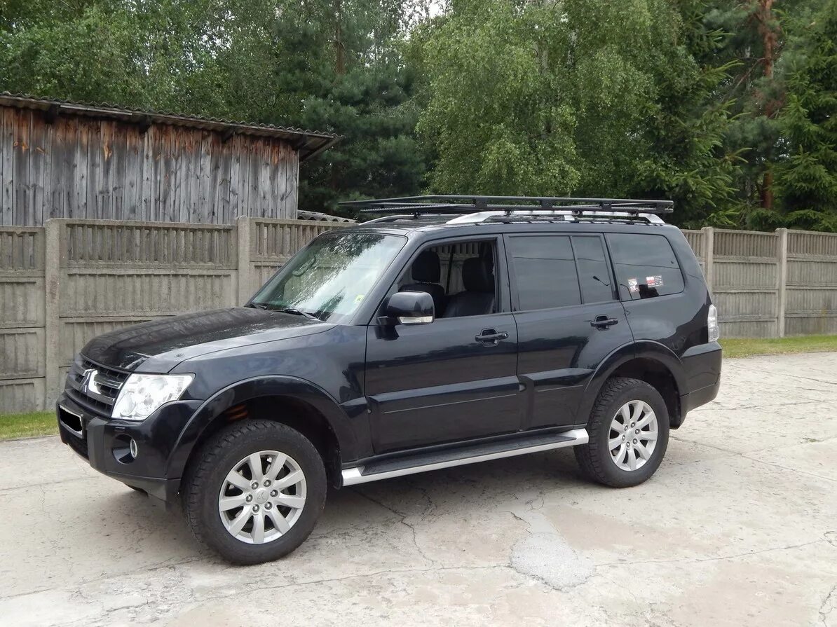 Mitsubishi pajero 2002. Экспедиционный багажник паджеро спорт 2. Экспедиционный паджеро 2. Митсубиси паджеро спорт 2 зад. Mitsubishi pajero sport ii (2008-2016).