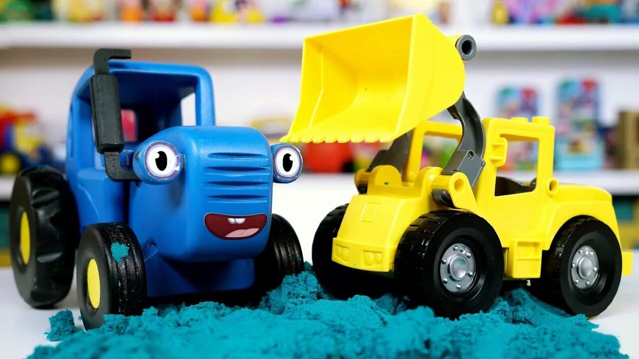 Синий трактор новочеркасск. Синий трактор. Синий трактор игрушка. Разноцветные тракторы. Синий трактор машинки.