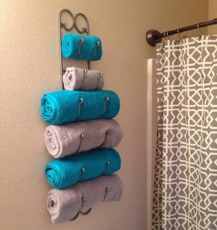 Как хранить полотенца. Хранение полотенец в ванной. Идеи для хранения полотенец. Хранение полотенец в ванной комнате идеи. Полки для хранения полотенец.