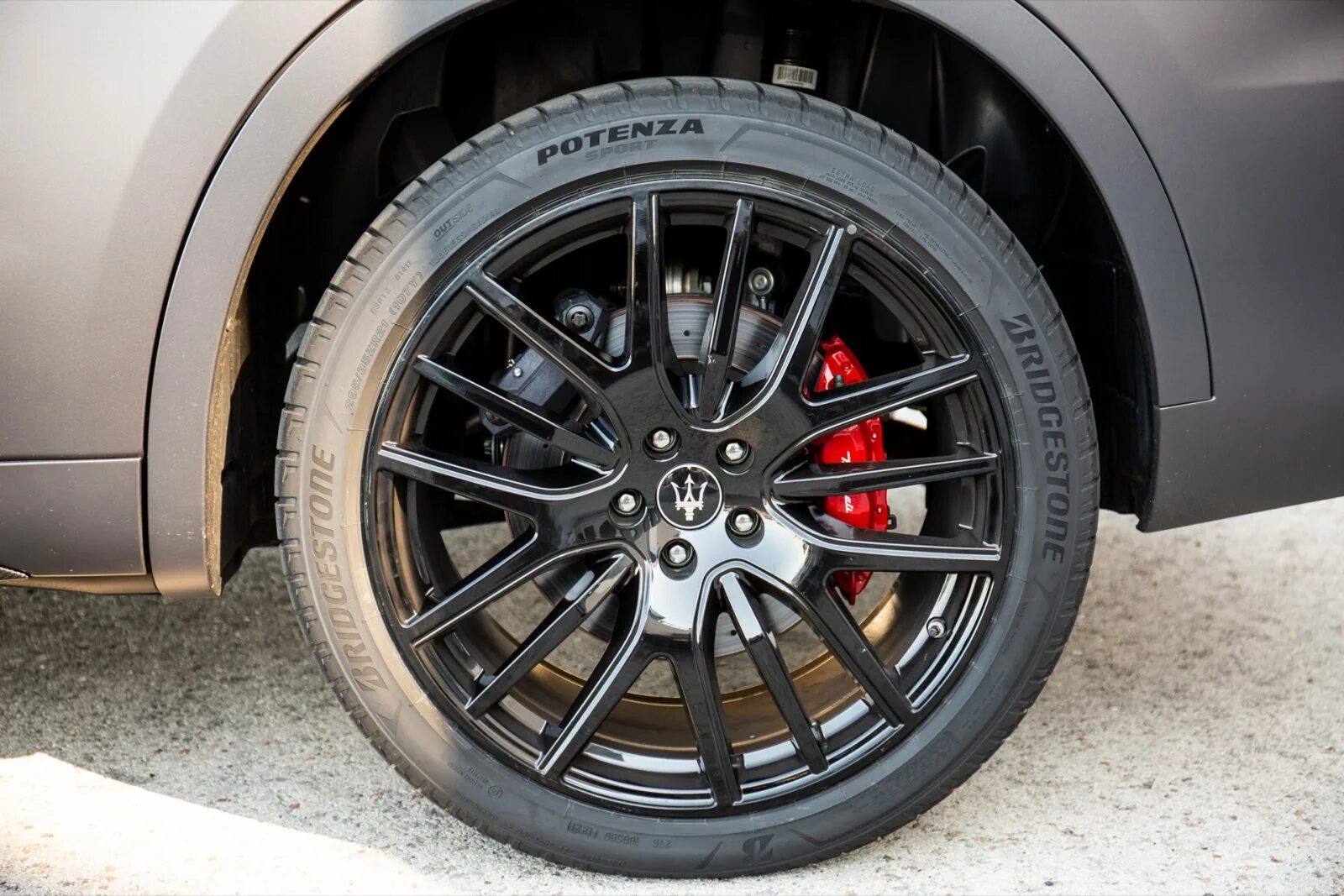 Бриджстоун Потенза спорт. Bridgestone 235/45r18 98y XL potenza Sport TL. 255/50 R19 Bridgestone potenza Sport 107y XL. Бриджстоун Потенза спорт 265.65.17.