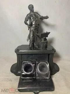 Часы с кузнецом
