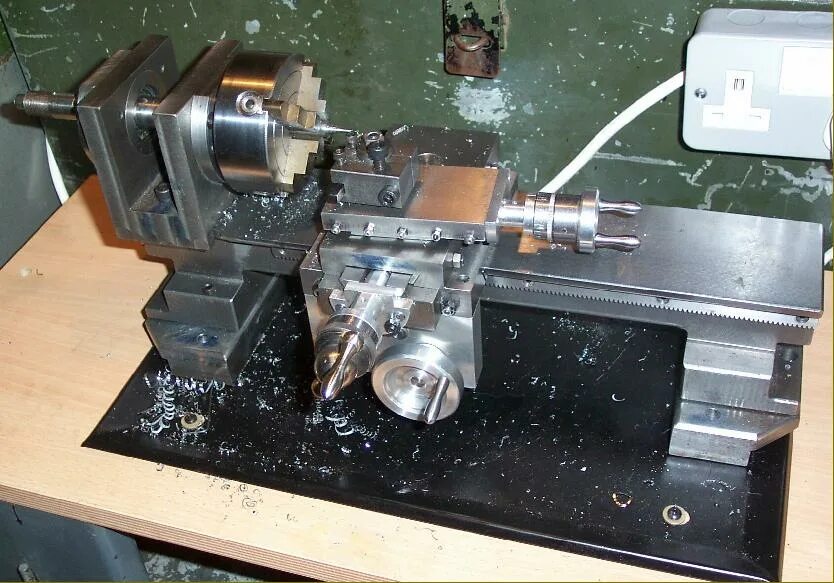 микро токарный станок по металлу. мини токарный станок из двигателя уад-52. 1д601 станок настольный токарный. токарный станок тн-1. самопальный токарный станок.