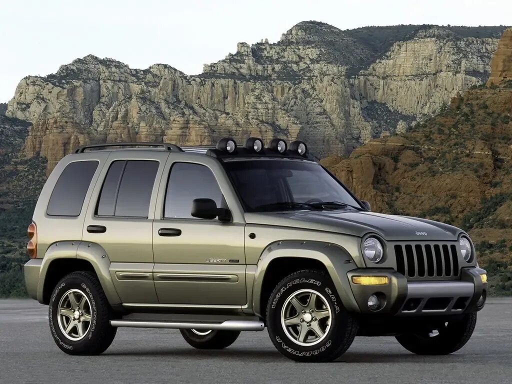 Либерти авто. Джип либерти 2002г. глушитель jeep liberty kj 3.7. jeep liberty 2009. jeep liberty limited.