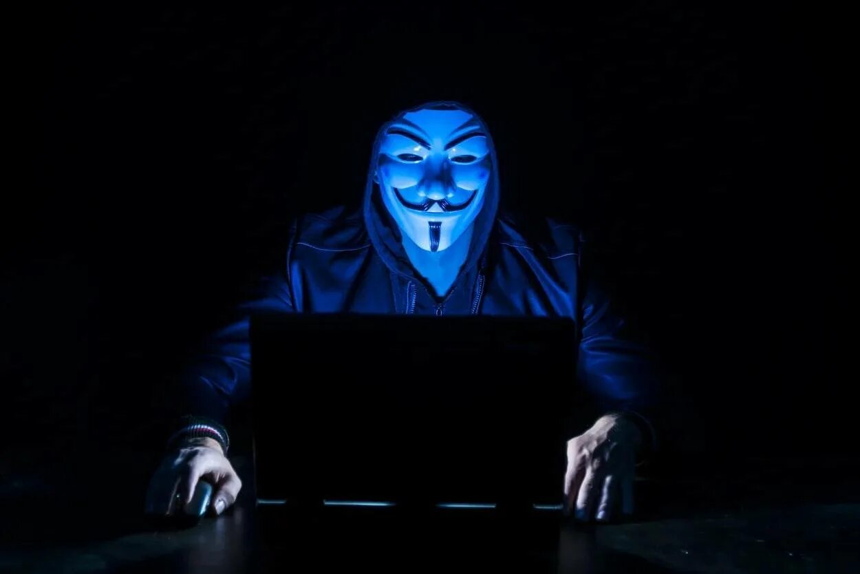 Аноним новая. Hacker анонимус. Анонимус синий. Маска хакера. Anonymous хакеры.