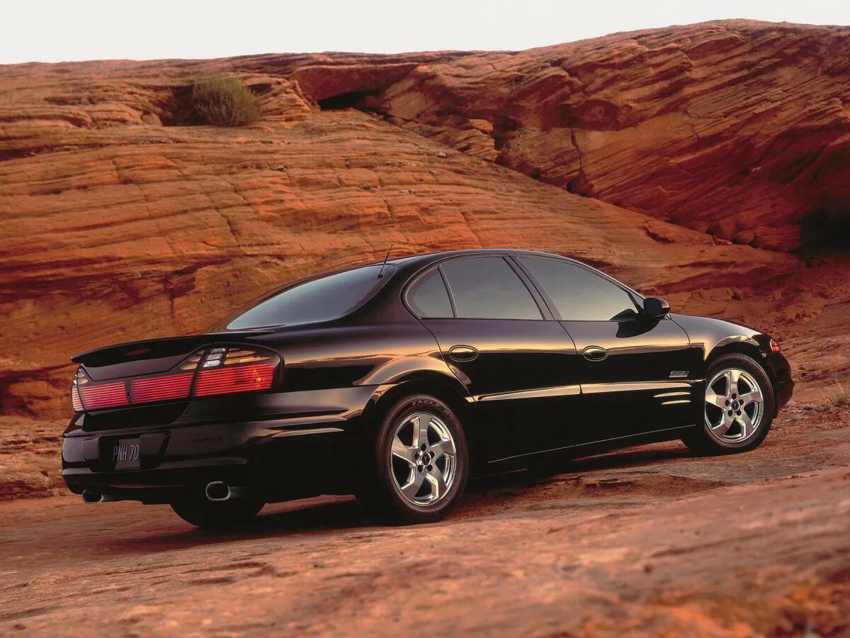 Pontiac bonneville. Понтиак Бонневиль. Понтиак Бонневиль 2005. Понтиак Бонневиль 2000. Pontiac Bonneville 2005 года.