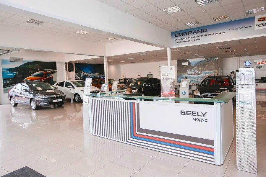 джили дц. дилер джили воронеж. Geely модус. румос авто. автосалон фасад.