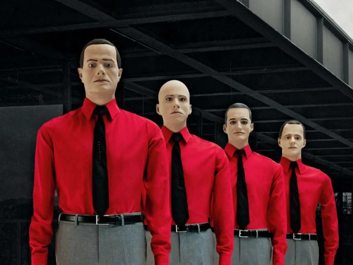 Крафтверк робот. Крафтверк группа. немецкая группа kraftwerk. группа kraftwerk 2025. kraftwerk немецкий музыкальный коллектив.