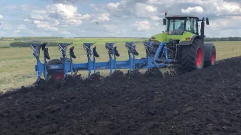 Трактора видео плуги