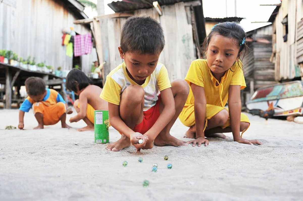Play in the middle. Ancient playing kids. burma village kids. school children observe cleanliness uz. kids playing in middle of the city uzbekistan.