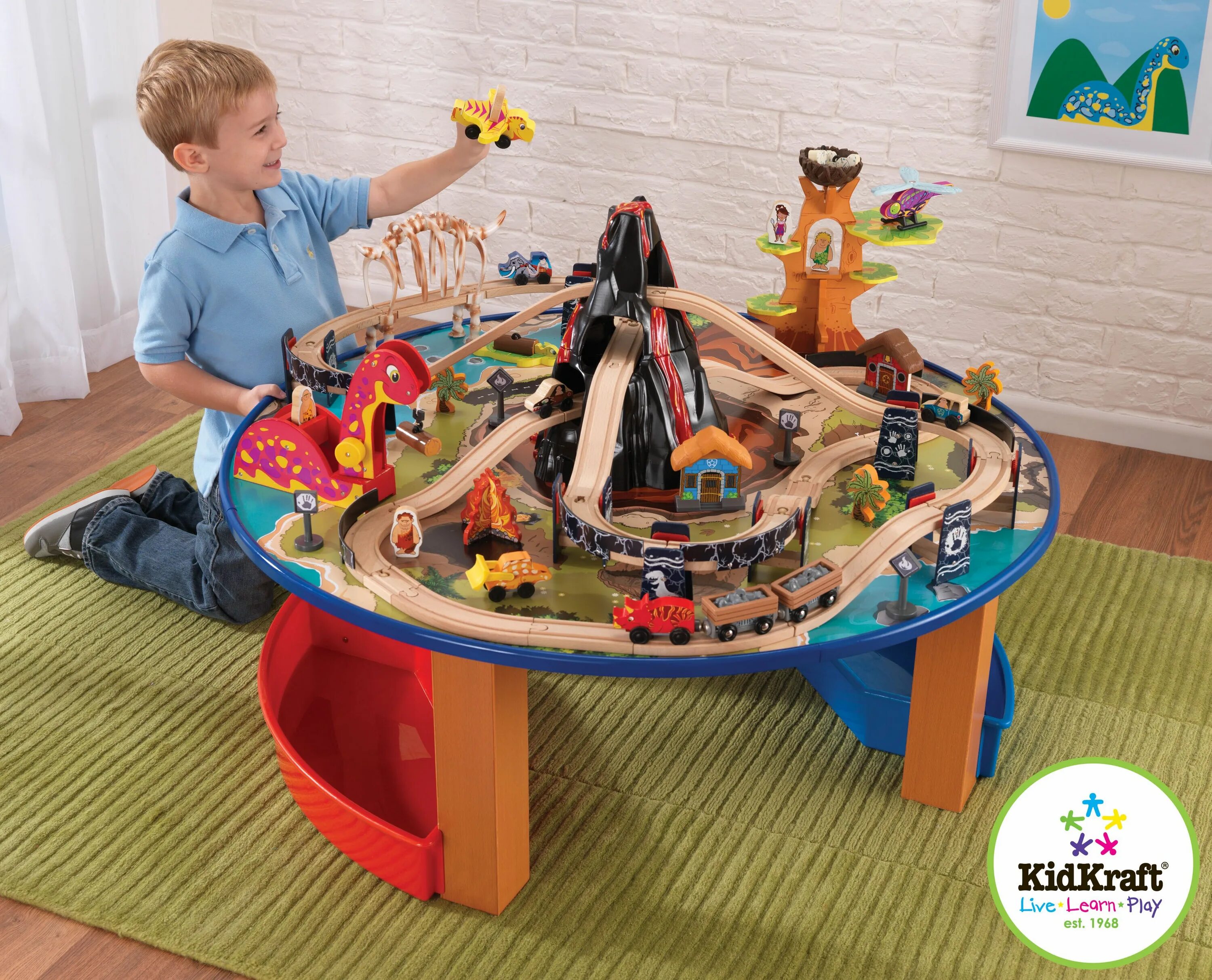 Деревянная железная дорога kidkraft 17978. Железная дорога Кидкрафт kidkraft. Kidkraft железная дорога со столом. Kidkraft стартовый набор "динозавр", 17978. Купить игрушку 6 лет