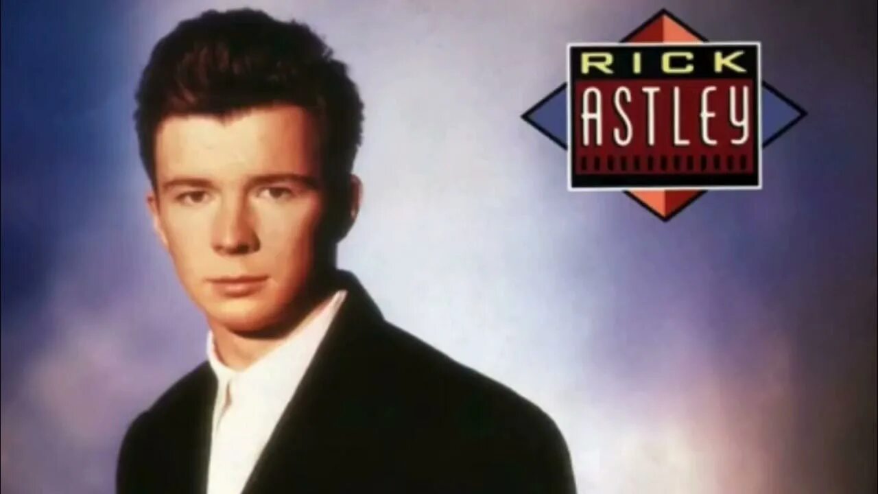 Never gonna give u up. Рик Эстли never gonna. Рик Эстли 1987 рикролл. Рик Эстли фото. Rick Astley never gonna give you up.